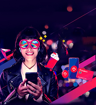 #PraCegoVer Texto: Cartão Bradesco. Tá em todo lugar, até no cartão. Imagem: moça de cabelos na altura dos ombros, com desenho de óculos de sol colorido em seu rosto e vestida com uma jaqueta de couro está sorrindo enquanto segura seu celular com ambas as mãos. Ao redor dela tem ícones ilustrando dispositivos eletrônicos e momentos da vida em que o Cartão Bradesco está presente.